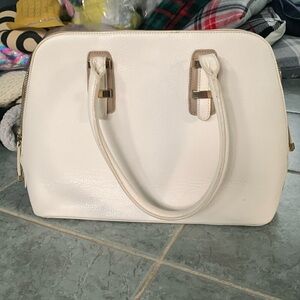 Charming Charlie cream colored bag
